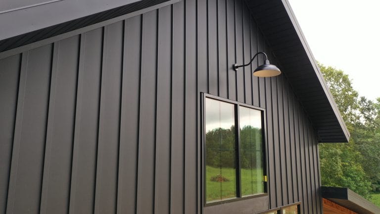 Metal board and batten siding on a luxury home